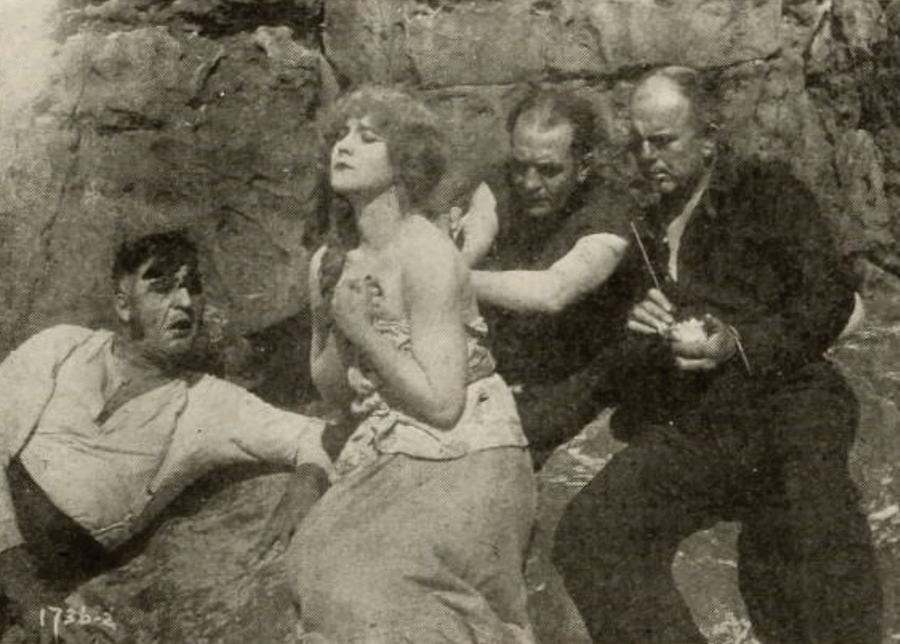 The Grasp of Greed scene