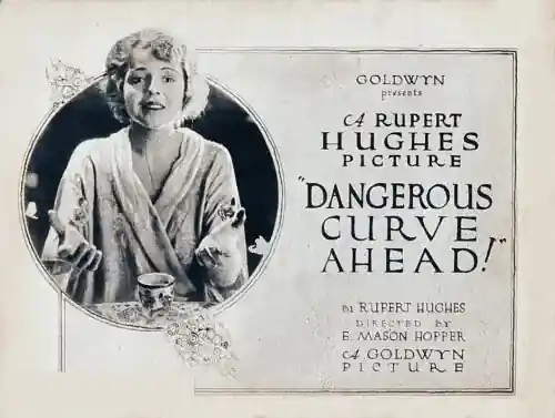 Dangerous Curve Ahead scene