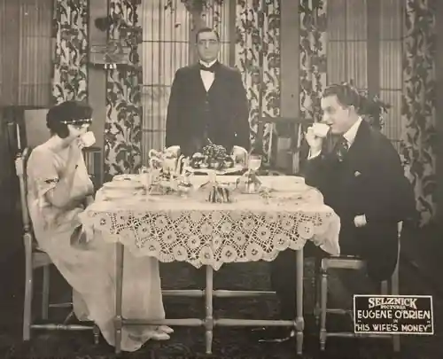 His Wife's Money scene