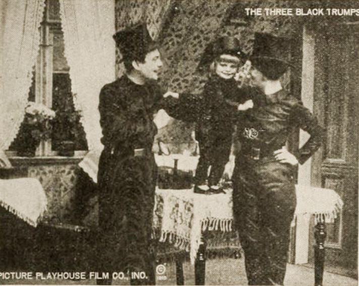The Three Black Trumps scene