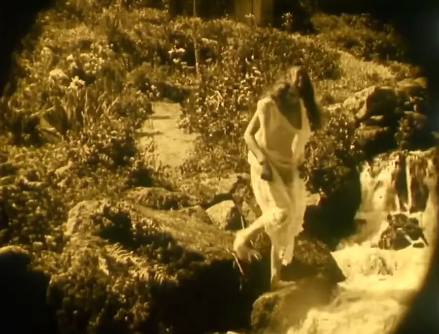 Nude Woman by Waterfall scene